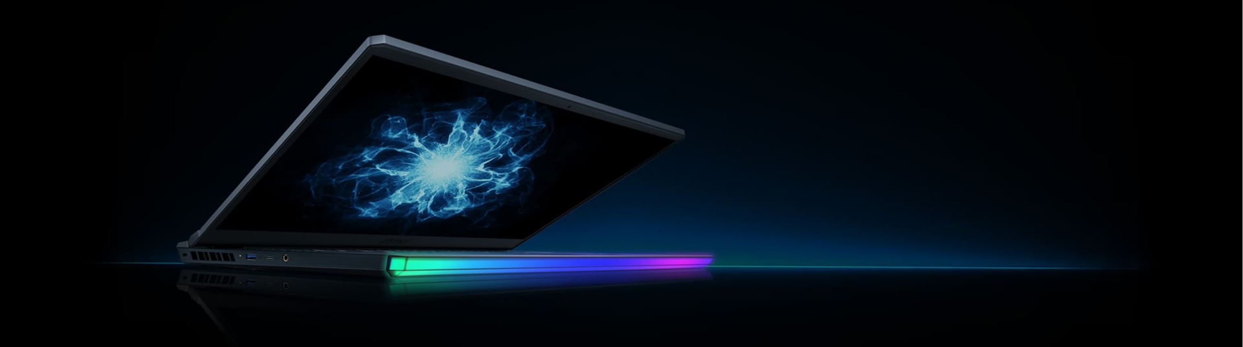 A GE66 Raider laptop is emitting RGB light at the edge of the keyboard.